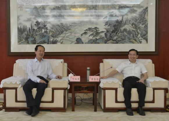 丁焰章拜會南昌市委副書記、市長黃喜忠